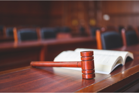 Court room with gavel and book on a table